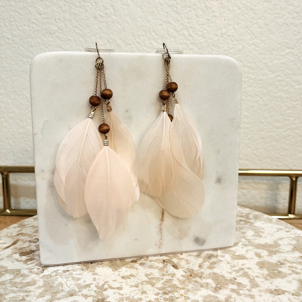 Champaign colored feathered earrings with beads